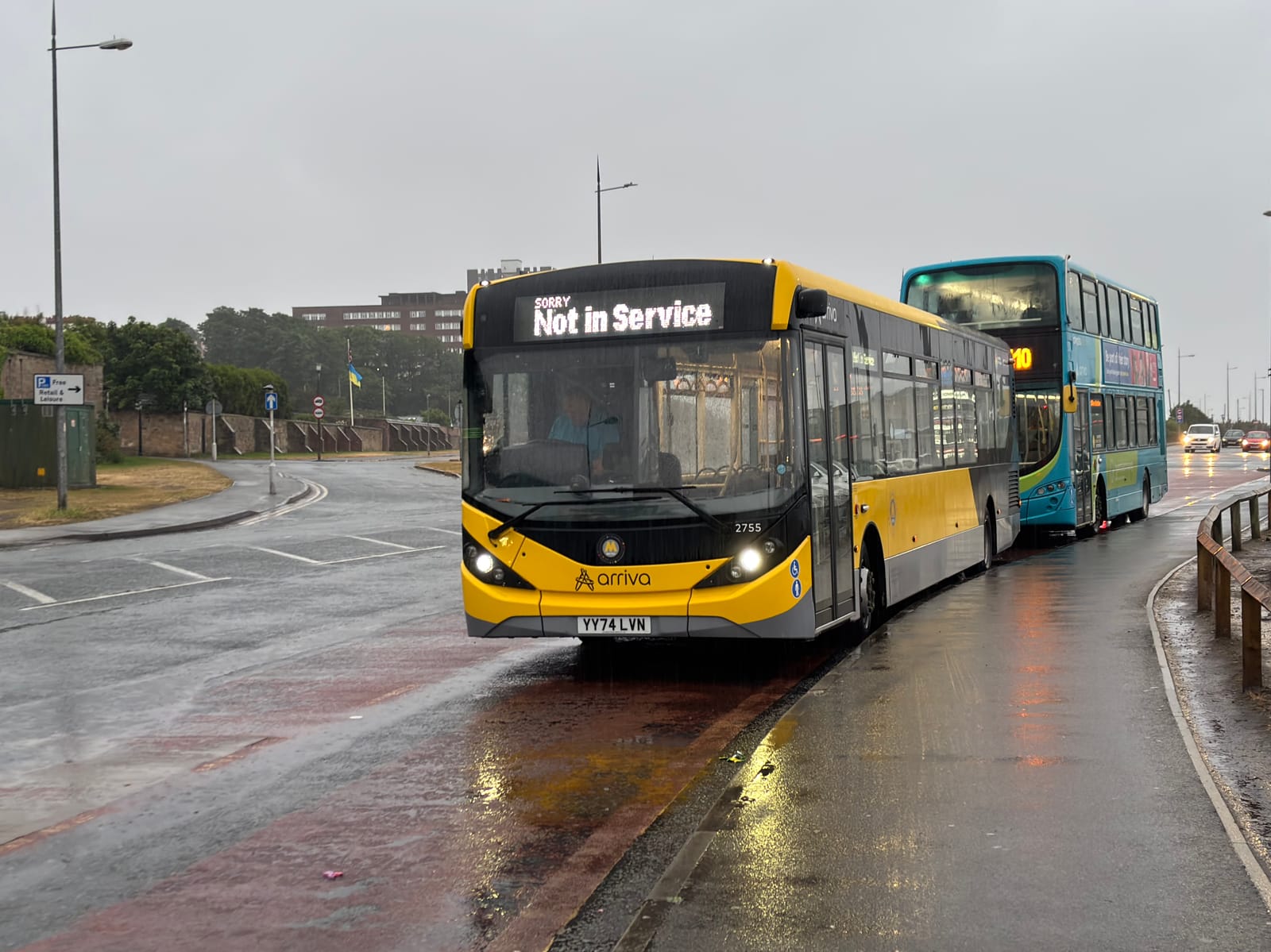A bus in the yellow Liverpool City Region Metro livery