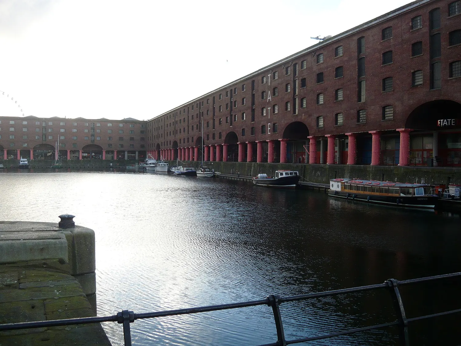 The cast iron colonnades running along the quayside at Royal Albert Dock