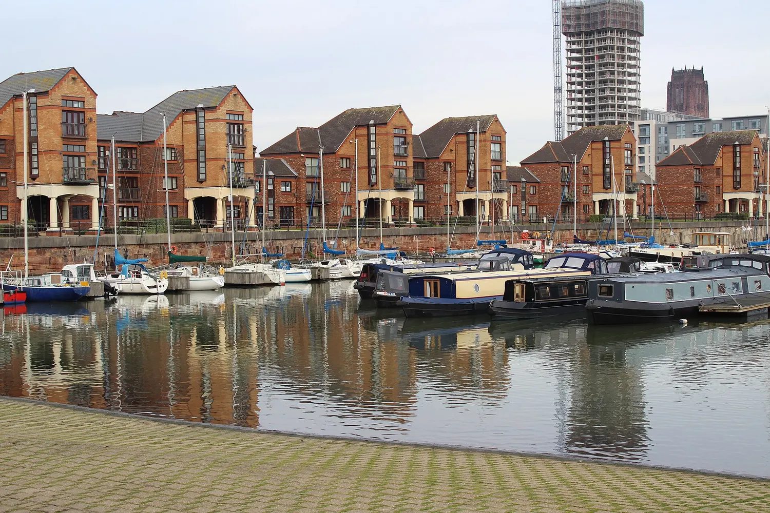Yachts and small boats moored at Liverpool Marina in Coburg Dock